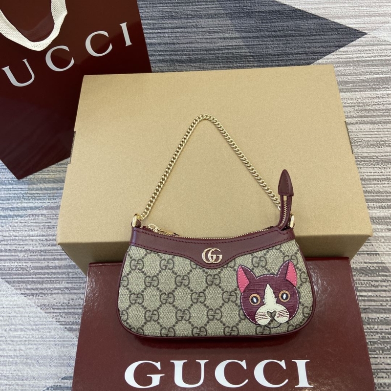 G*u*i top handle bags
